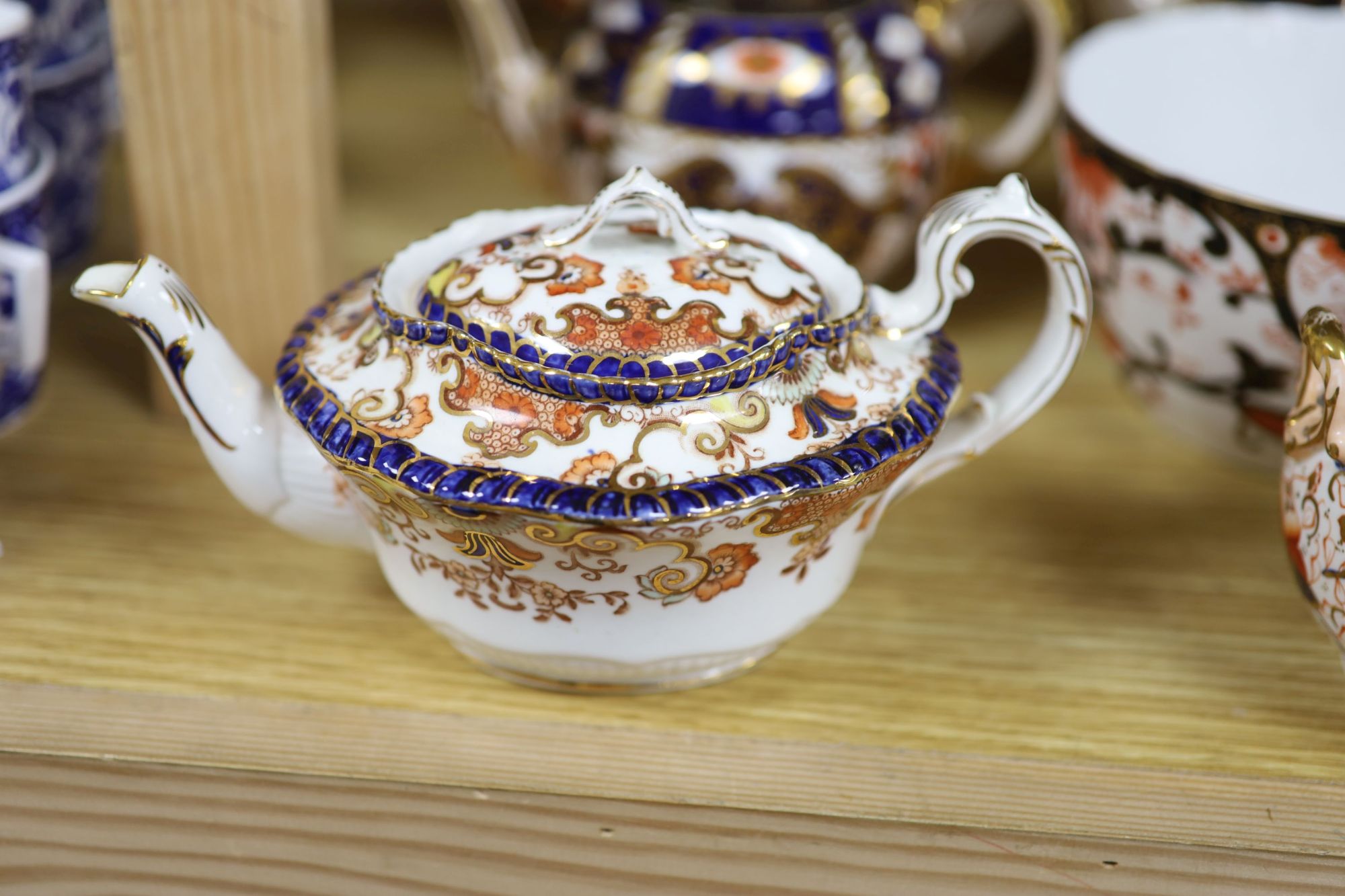 A quantity of Davenport and Staffordshire Imari pattern tea and coffee wares